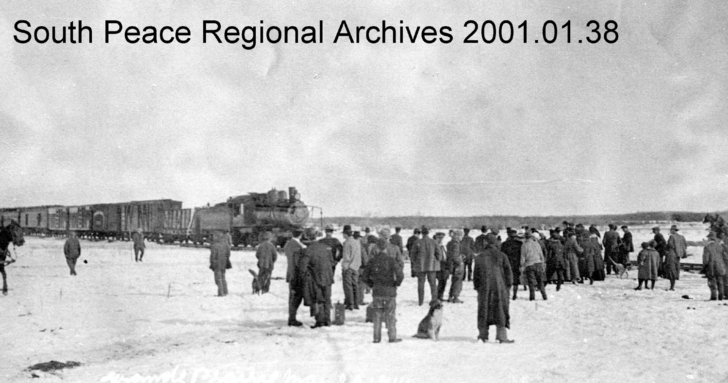 Grande Prairie villagers greet the Edmonton, Dunvegan & British Columbia train as it reaches the end of steel on March 29, 1916. 