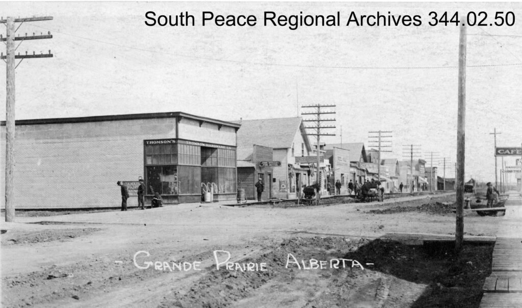 Looking west down Richmond Avenue ca. 1920, with Thompson's Hardware, John McCauley Fur Buyers, Owens & Johnson, and Imperial Bank of Canada the most visible buildings